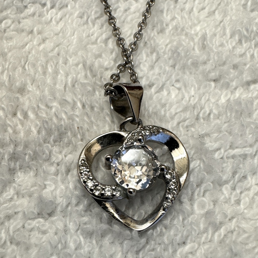 Sterling Silver CZ heart pendant solitaire w/accents. 18’ chain w/2’ extender